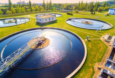 Aerial view to sewage treatment plant. Grey water recycling. Waste management in European Union.